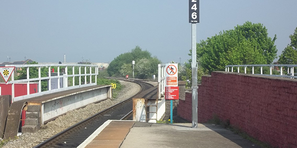 Trespass image of signs at the end of platform