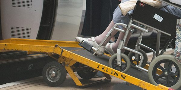 Wheelchair user boarding a train