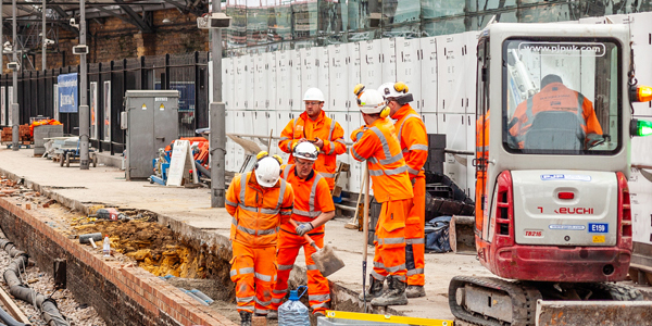 Trackside workers with plant machinery