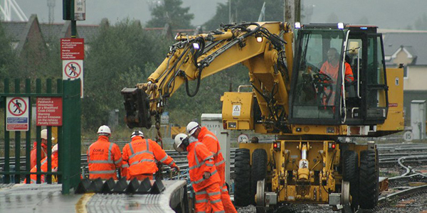 Track workers on site performing engineering work