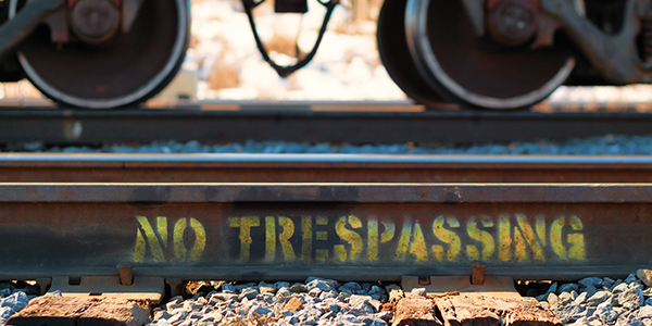 no-trespassing-signage-on-railway-track-promo