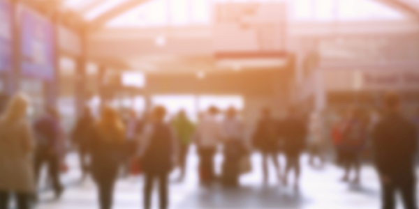 people walking on station concourse