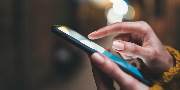 person-using-mobile-phone-promo